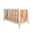 Shop the trend-setting boho crib from the BRANCH collection by Milk Street Baby.