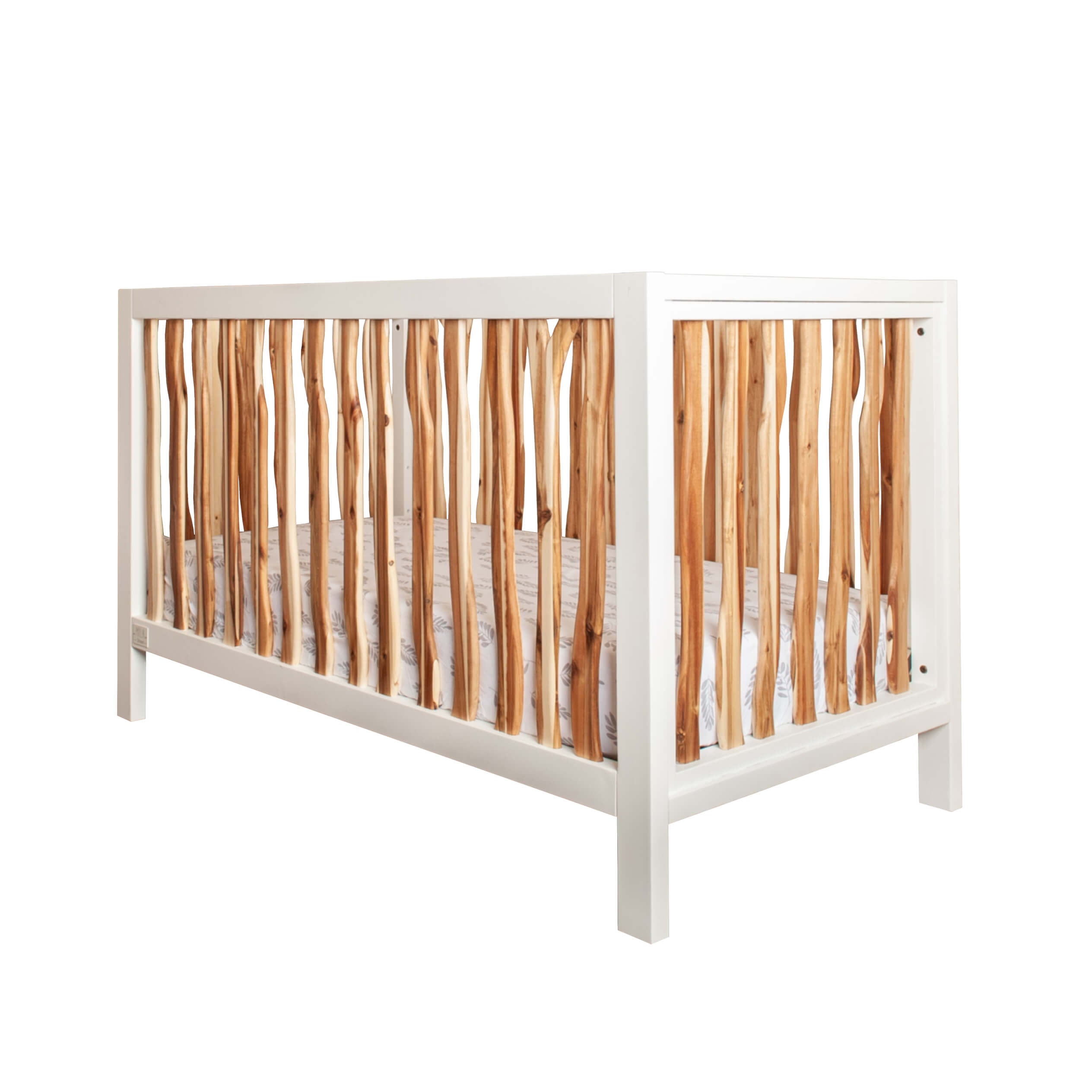 Shop the trend-setting boho crib from the BRANCH collection by Milk Street Baby.