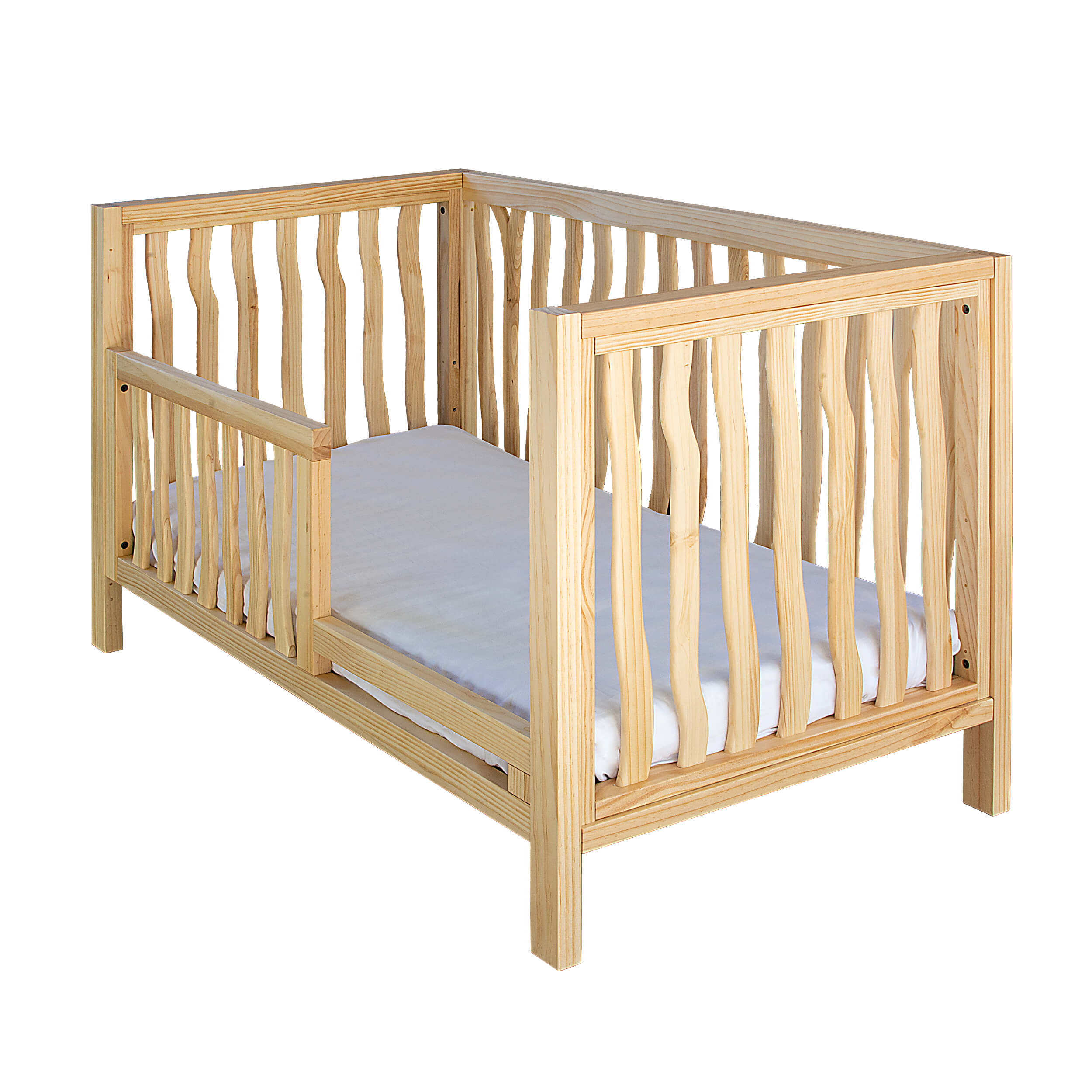 Shop the trend-setting boho toddler bed from the BRANCH collection by Milk Street Baby.