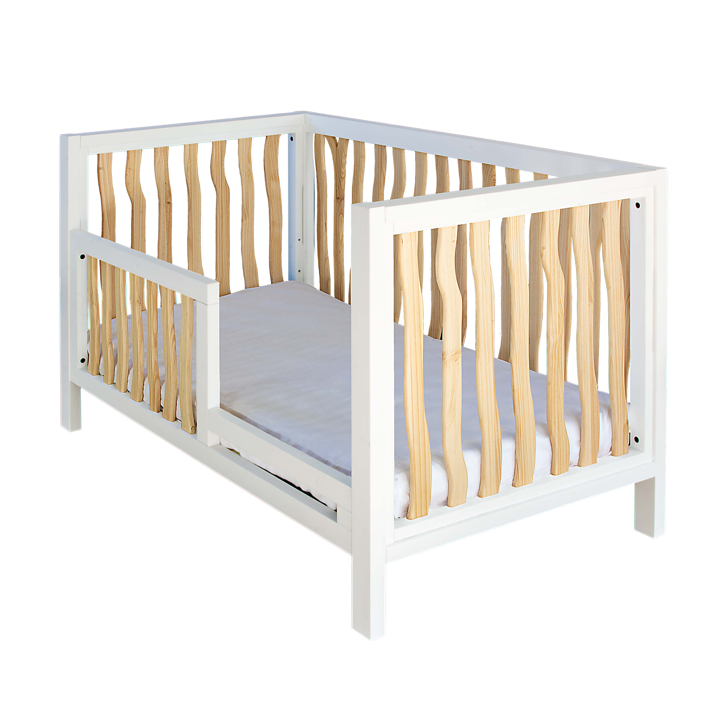 Shop the trend-setting boho toddler bed from the BRANCH collection by Milk Street Baby.