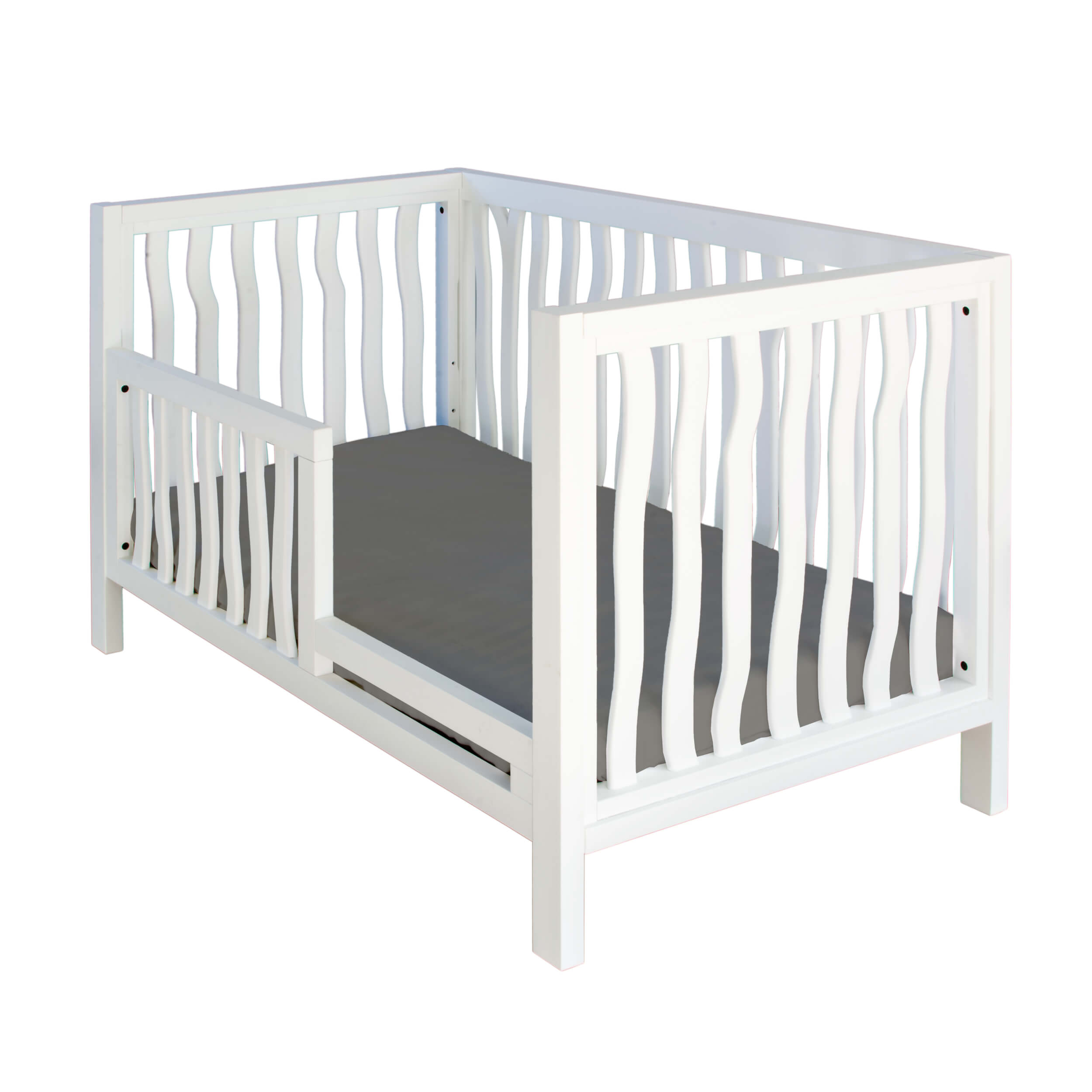 Shop the trend-setting boho toddler bed from the BRANCH collection by Milk Street Baby.