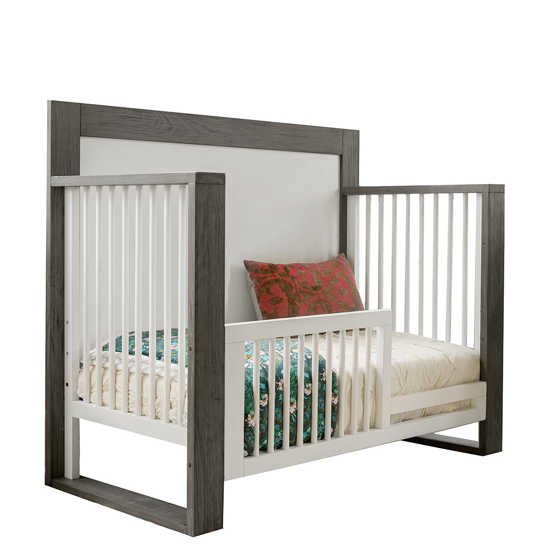 Shop the mid century toddler bed conversion kit from the TRUE collection by Milk Street Baby.