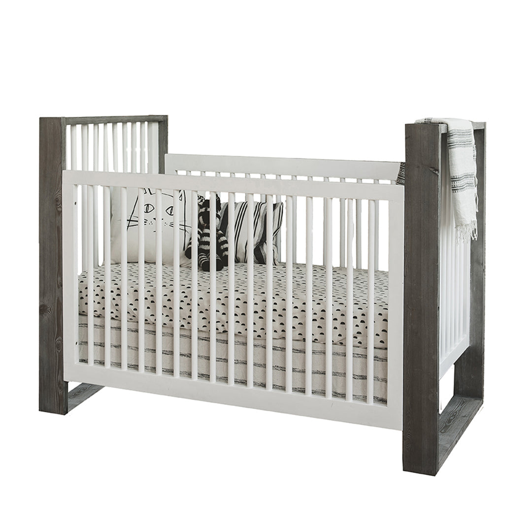 This traditional crib boasts angular lines of deeply distressed Spruce with a cubist style, you will truly own a “one of a kind” piece of art!
