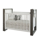This traditional crib boasts angular lines of deeply distressed Spruce with a cubist style, you will truly own a “one of a kind” piece of art!