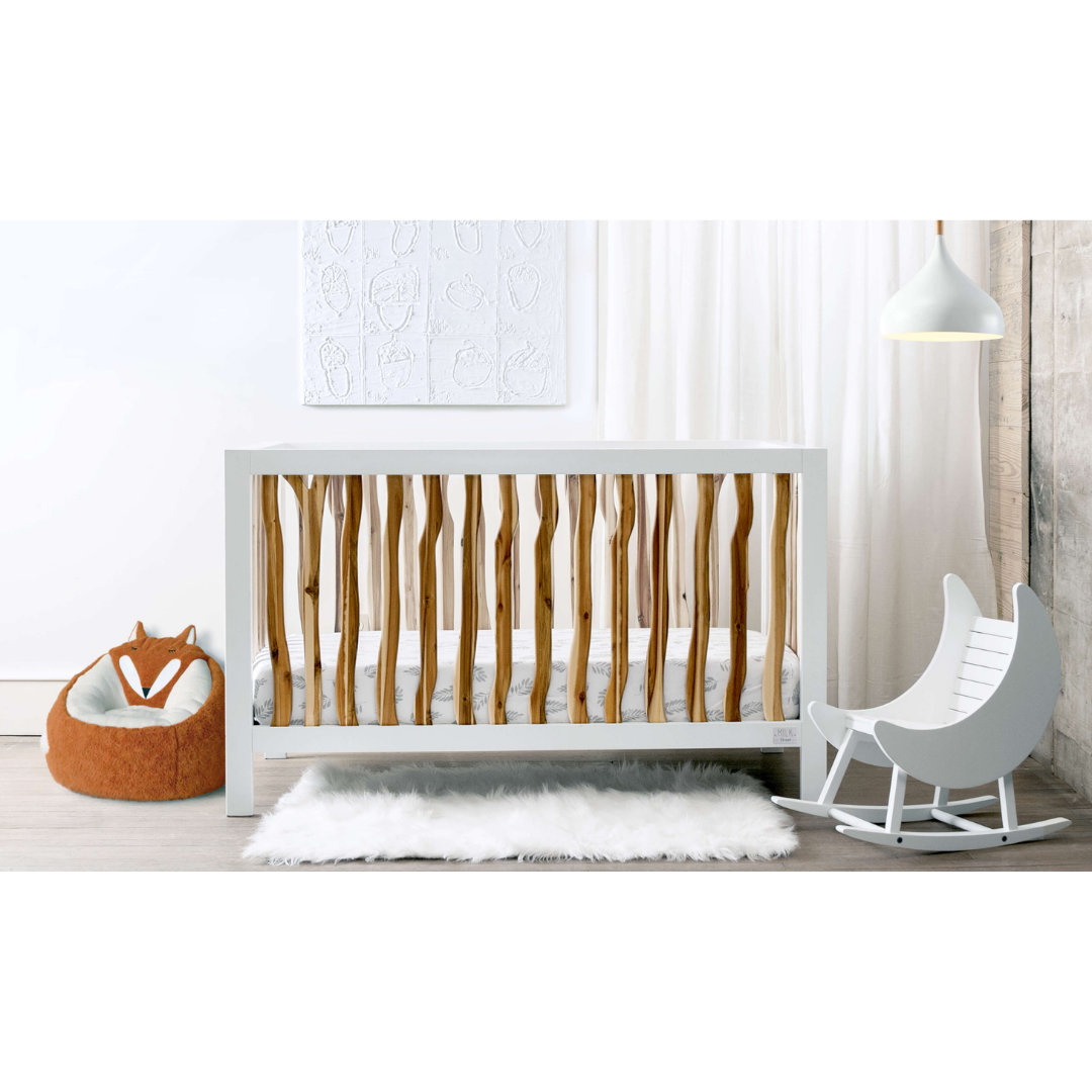 Shop the trend-setting boho crib from the BRANCH collection by Milk Street Baby.