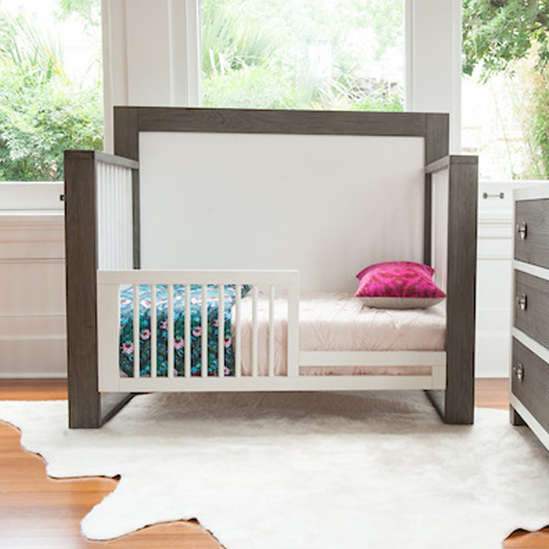 Shop the mid century toddler bed conversion kit from the TRUE collection by Milk Street Baby.