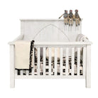 Shop the trend-setting farmhouse style crib from the RELIC collection by Milk Street Baby.